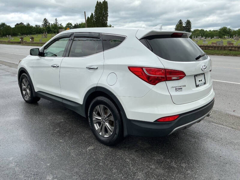 hyundai santa fe 2015 5XYZTDLB0FG305102 image hyundai santa fe 2015 5XYZTDLB0FG305102 image